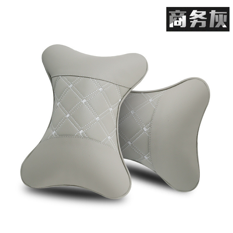 汽车护颈枕车用内饰品一对装皮革车载小枕头骨头枕汽车用品四季通